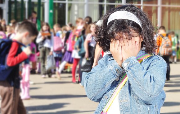 Children_Young Girl Covering Face with Hands recreation department emergency