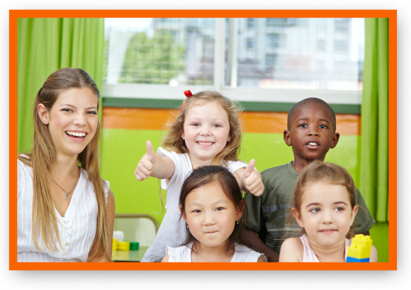 Happy kids with their teacher.